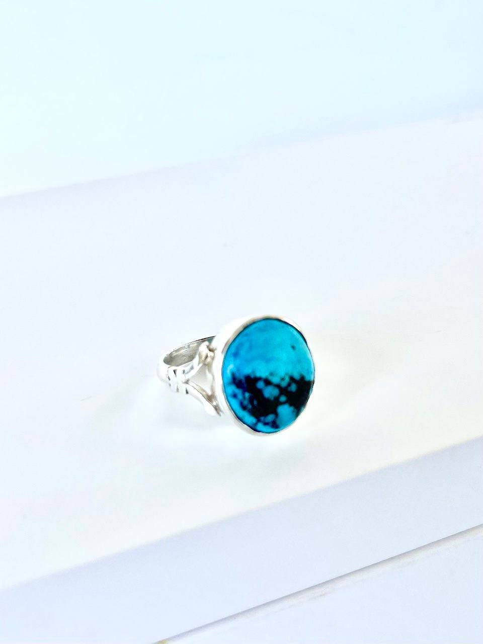 Gemstones with sterling silver Giro a blue green