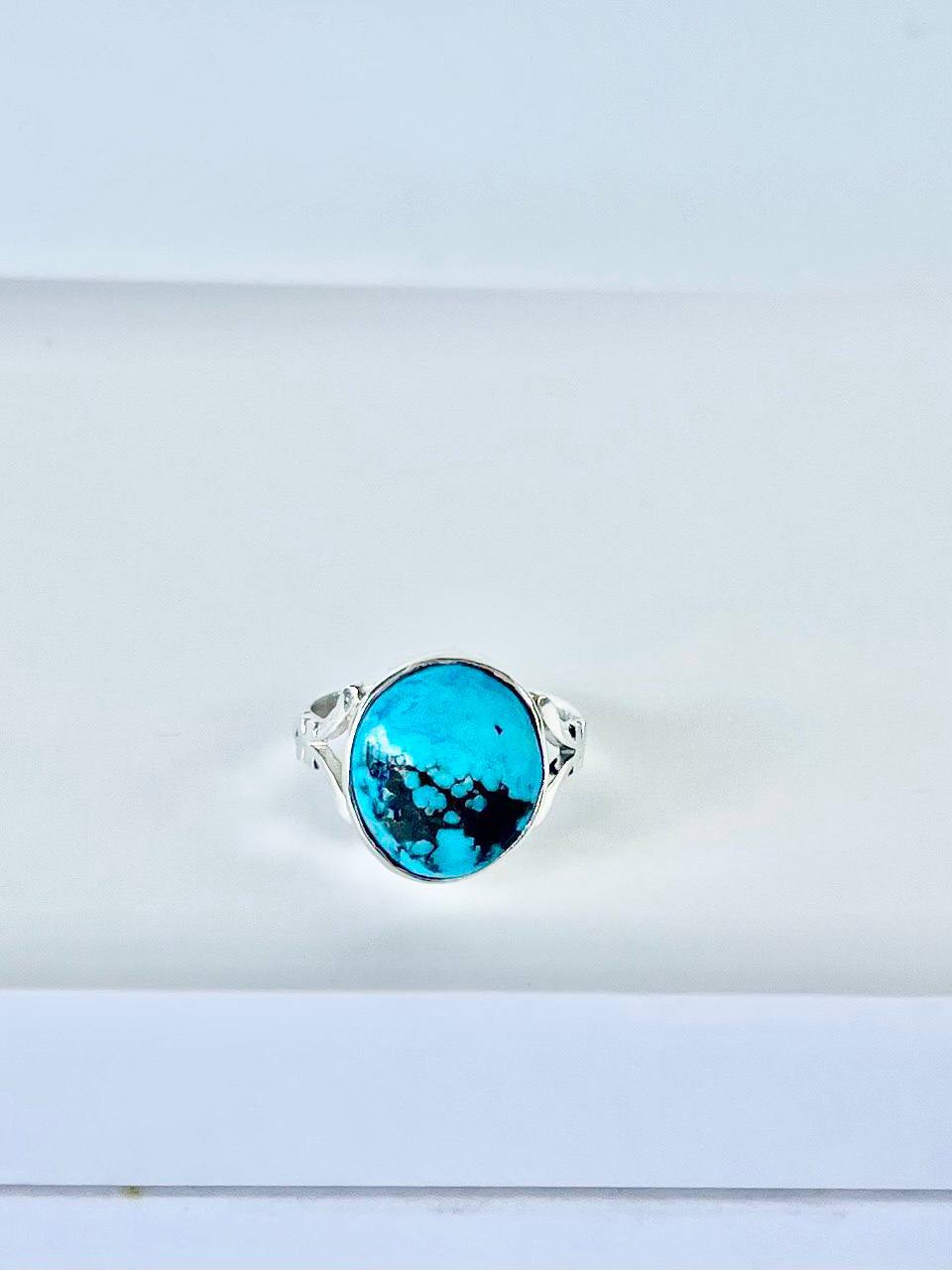 Gemstones with sterling silver Giro a blue green