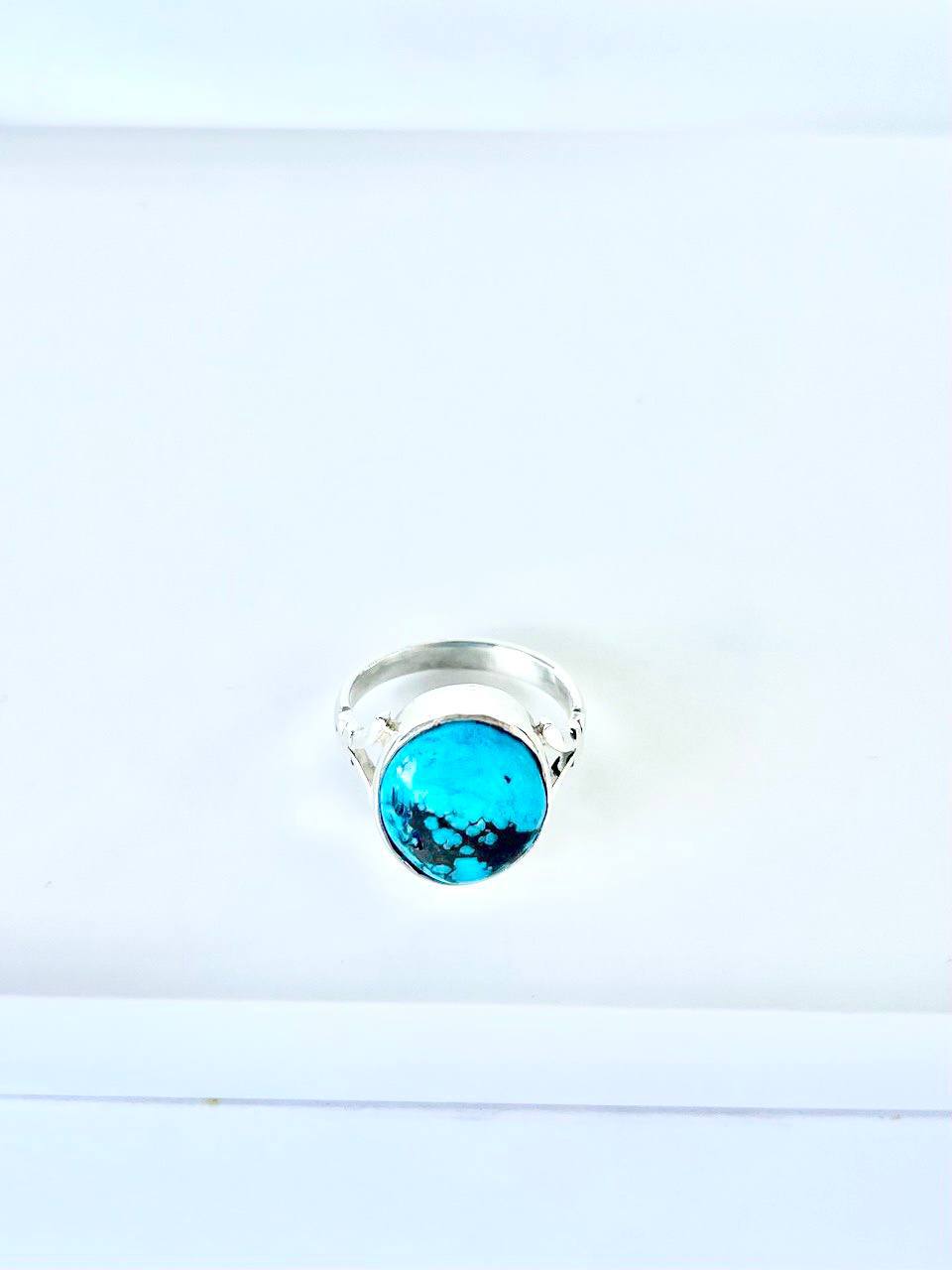 Gemstones with sterling silver Giro a blue green